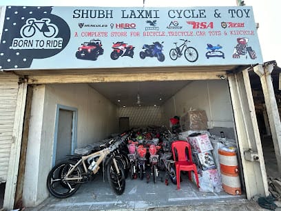 Subh laxmi cycle and toys better car woker tricycle and more business photograph