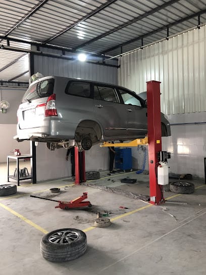 Autocalidad Customization & Emporium || Best car service, denting, painting and detailing provider business photograph