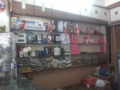 AHUJA Mobile The Complete Mobile shop Spl. In Copmuterised Reparing Spare parts business photograph