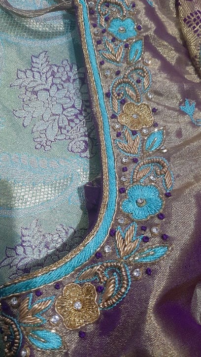 YOUNG LADY STITCHES business photograph