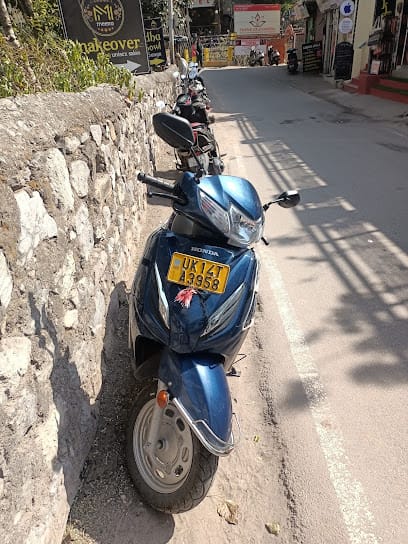 Devbhumi Bike rental and clothes business photograph