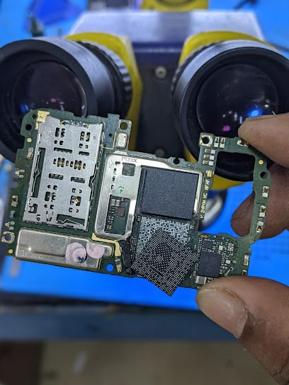 FIX IT mobile phone service centre business photograph