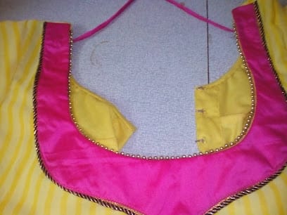 SHAILA BUTTON HOUSE, the shop for ladies gents and kids Wear. All TAILORING materials available business photograph