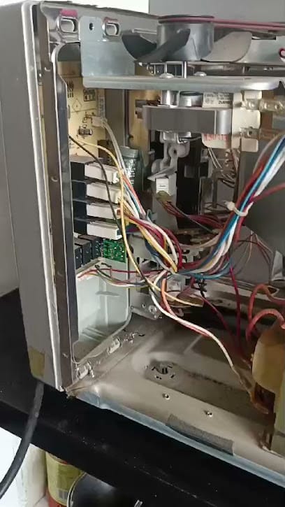 Ratan geyser , ac, microwave oven, washing machine service repair business photograph