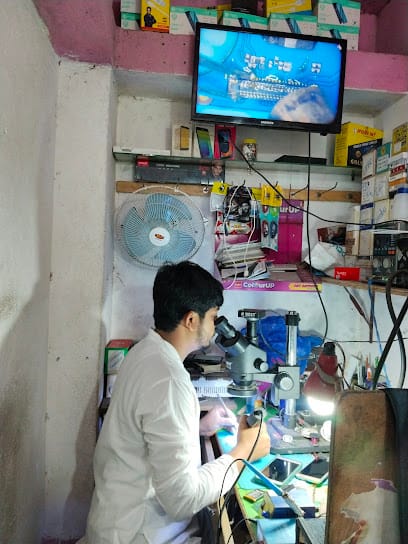 digital world MOBILE and TV repairing centre business photograph