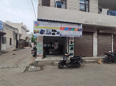 DHIMAN REPAIR CENTER business photograph