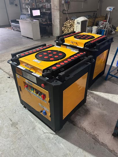 Saluja Engineers, Pune. construction equipments, half bag mixer , mini cranes, bar bending machine, bar cutting machine business photograph