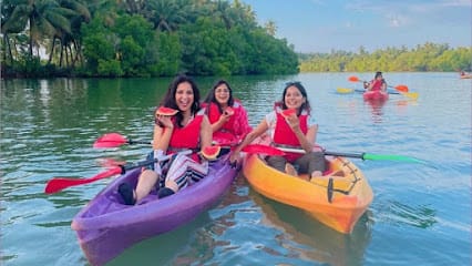 Mulki surfing and kayaking by KayakBoy business photograph
