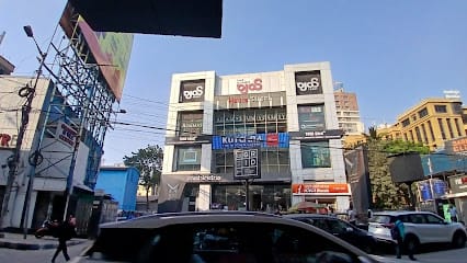 Nirmal Creations - bridal lehengas, bridesmaid lehengas, designer sarees, gowns, suits and tunics store in kolkata business photograph