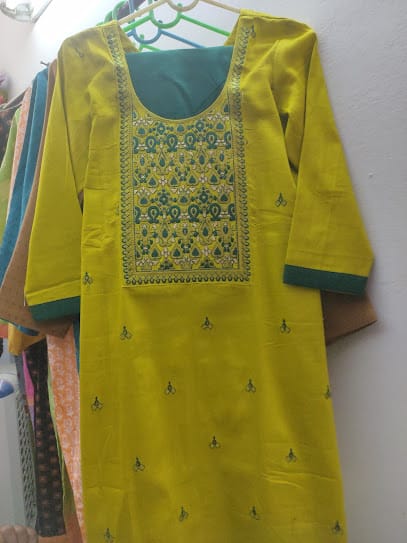 Fashion tailors ladies suit and blouse business photograph