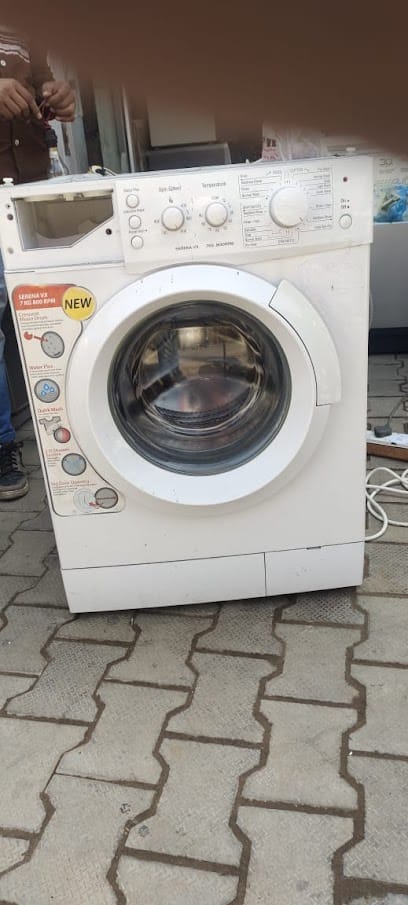 Washing Machine Repair Service | New Star Electro | Washing Machine Repair | Refrigerator Repair | Microwave Oven repair business photograph