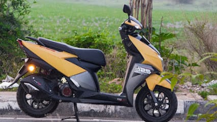 Casabella Rental Scooter | Bike Rent In Alleppey | Scooters For Rent In Alappuzha business photograph