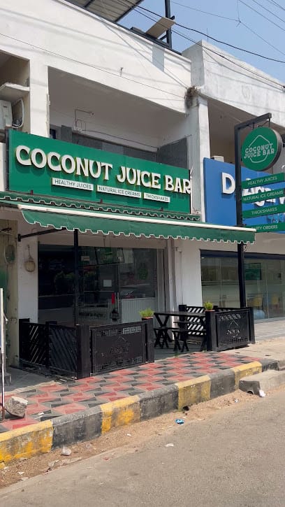 Coconut Juice Bar & The Burger Stories Cafe Best TopNo1 TenderCoconut Water Juice Shake Natural Icecreams Burgers In Nalgonda business photograph