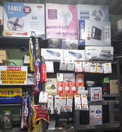 GURU ELECTRICAL,(Repairing,And Sales)Mobile Accessories. business photograph