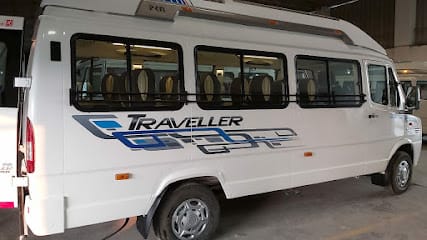 Mahakaleshwar travels | tempo traveller on rent in Indore | Tempo Traveller 26 seater rent business photograph