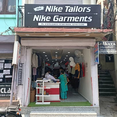 NEW NIKE TAILORS & GARMENTS business photograph