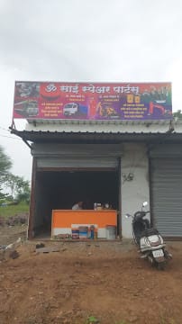 Om sai spear part and Jcb parts business photograph