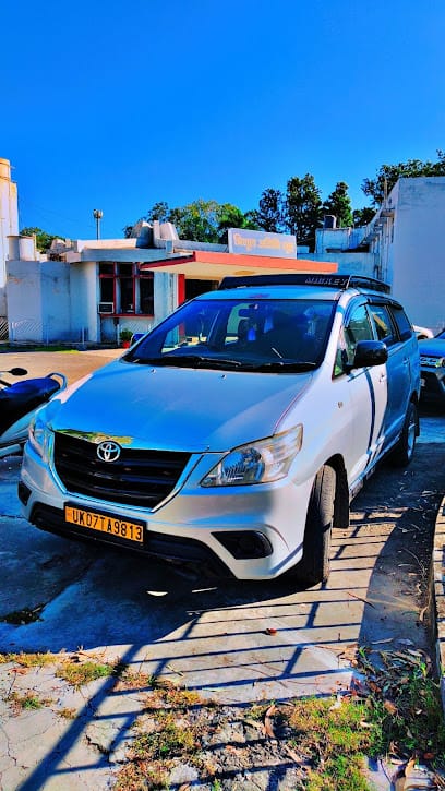 Travel with Ansh | best taxi service in mussoorie | cabs service in mussoorie business photograph