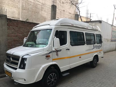 Purvi Car Rental | Tempo Traveller in kanpur business photograph