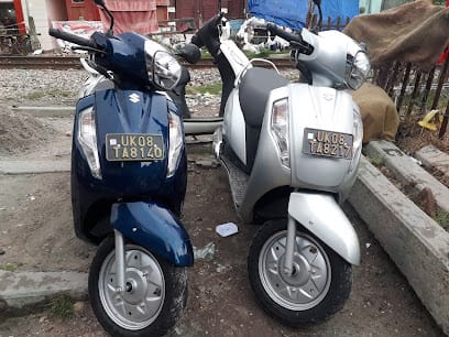 Karishma ride , bike and scooty on rent business photograph