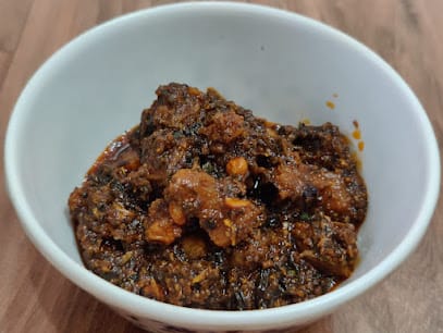 Nakshatra's Chicken pickle. business photograph