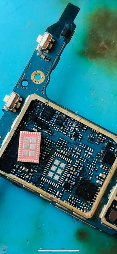 Mobile Store. Repair & Chip Level Service Center business photograph