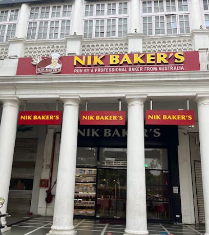 NIK BAKER'S business photograph