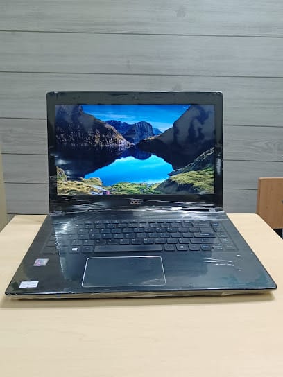 TAPI INFOTECH The Complete Laptop Solutions business photograph