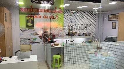 JOY MOBILES -Mobile phone Repair services sales Accessories shop business photograph