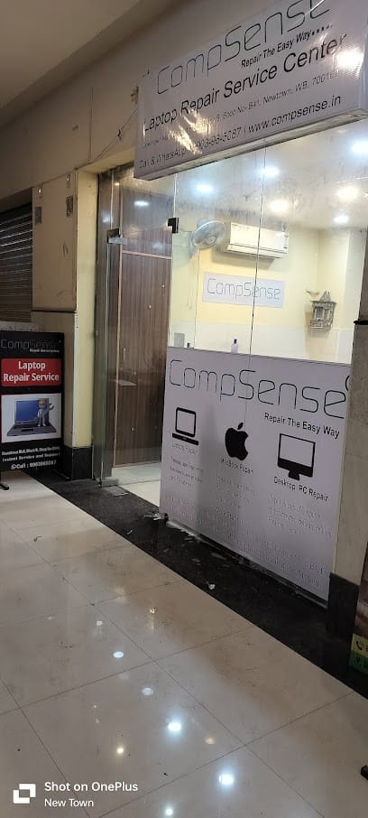 CompSense - Laptop Repair Specialist. business photograph