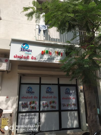 Pooja Embroidery Thread business photograph