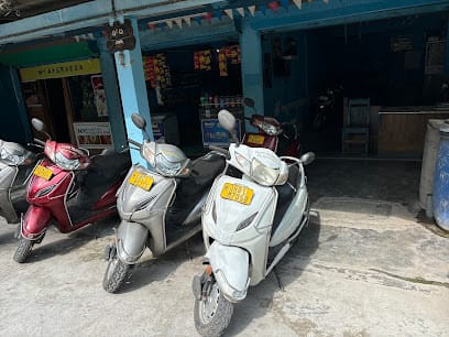LAXMI TRAVELS,two wheeler rent business photograph