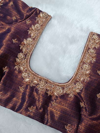 Designing Angel (Fashion designer) business photograph