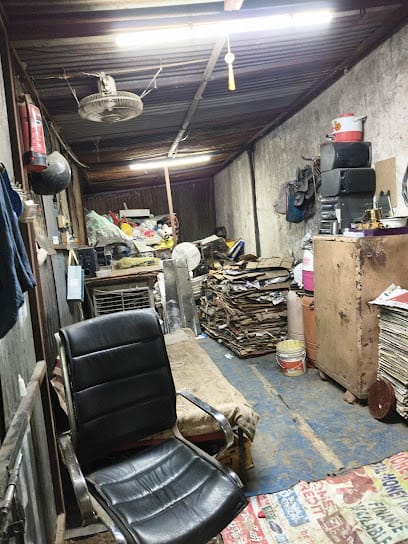 Iqbal Khan scrap shop business photograph