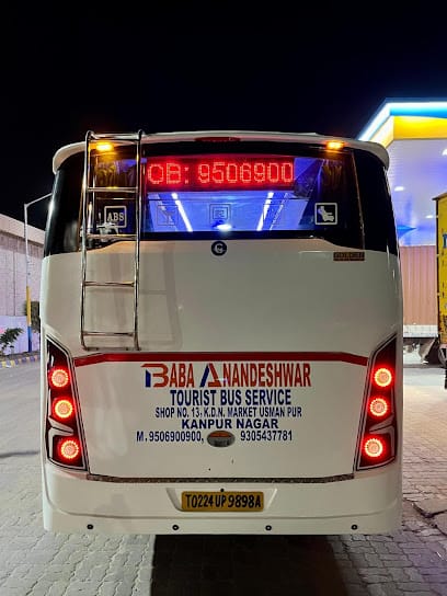 Baba Anandeshwar Tourist Bus Service Kanpur | Wedding Luxury Bus | Mini Bus in Kanpur | Tempo Traveller on rent in Kanpur business photograph