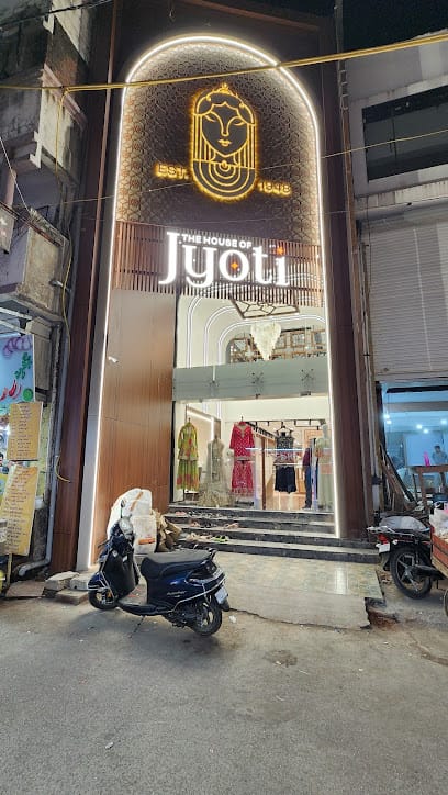 The House Of Jyoti - Best Multi Brand Women Wear Shop | Chaniya Choli, Pure Bandani Dress Material Shop in Junagadh business photograph