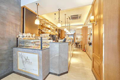 L'Opera Khan Market business photograph