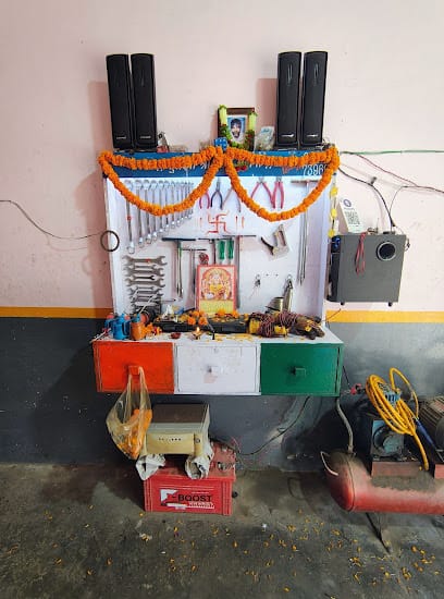 Mahadev bike repairing center business photograph