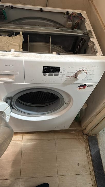 Quick Service Washing Machine Refrigerator Service Center business photograph