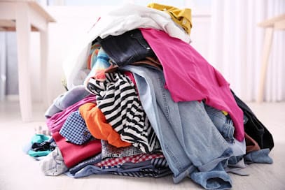 R v Second hand clothes buyer business photograph