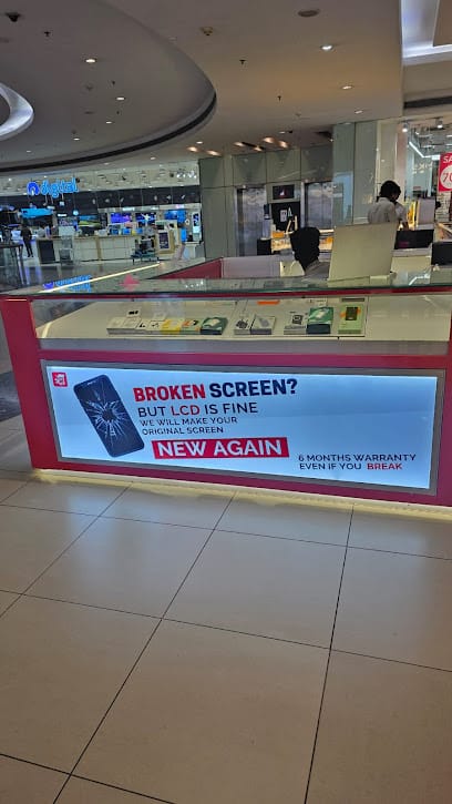 PHIXMAN - All Brand Mobile Repairing | DB Mall Bhopal business photograph