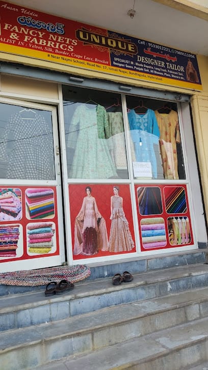 Unique Designer Tailor ( Unique Fancy Nets and Fabrics ) business photograph