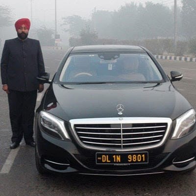 Caravan Rental Delhi - Hire Buses, Urbania, Vans, Cars business photograph