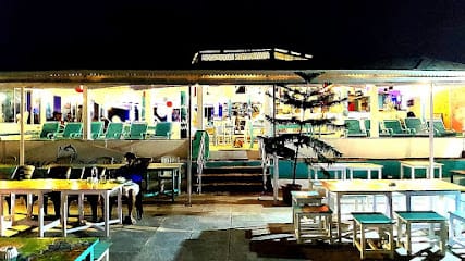 Flying Dolphin Beach side cafe by miami business photograph