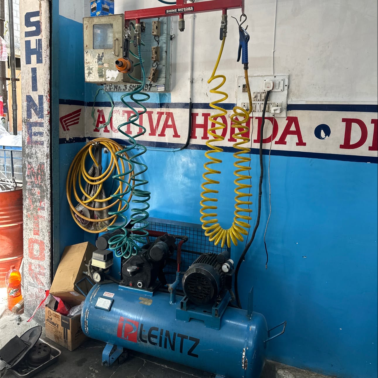 Shine Motors two wheeler service center business photograph