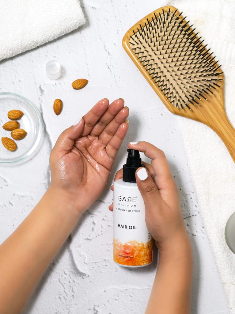 Revitalize Your Hair with BareMinimum Hair Oil - Infused with Moroccan Argan Oil, Sweet Almond Oil, Grapeseed Oil, and Jojoba Oil for Nourishment and Strength - 150ml for Men and Women view 2