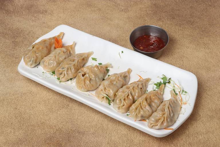 Steamed cheese & sweet corn momos