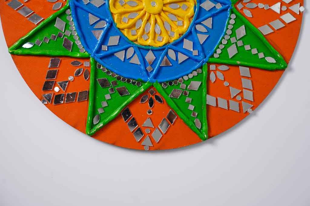 Lippan art, also known as mud and mirror work, which is a traditional mural craft view 2