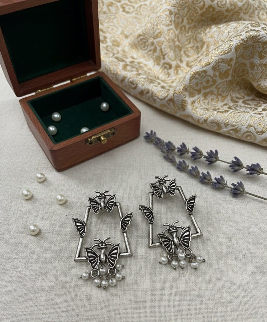 Glamvila Regal Swan and Butterfly Earring Combo view 2