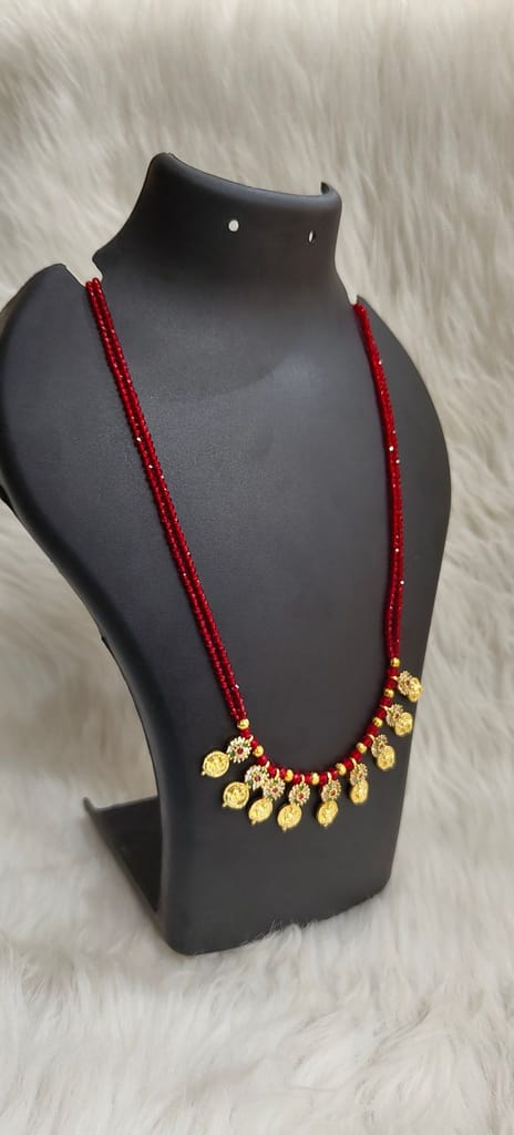 Delicate and elegant gold-plated long necklace with red beads and intricate detailing, perfect for any occasion. view 2